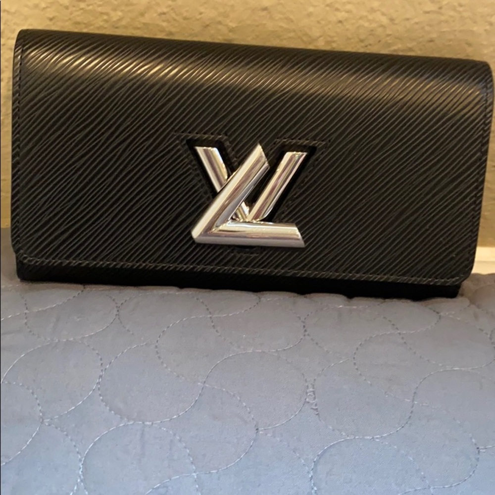 Louis Vuitton Twist clutch wallet $900